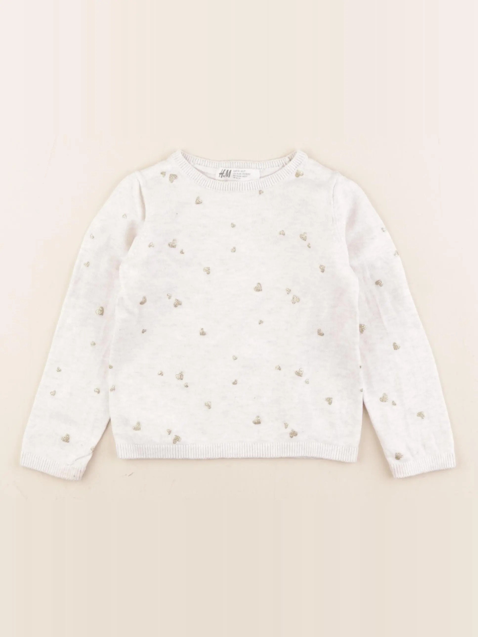 Pull beige, or