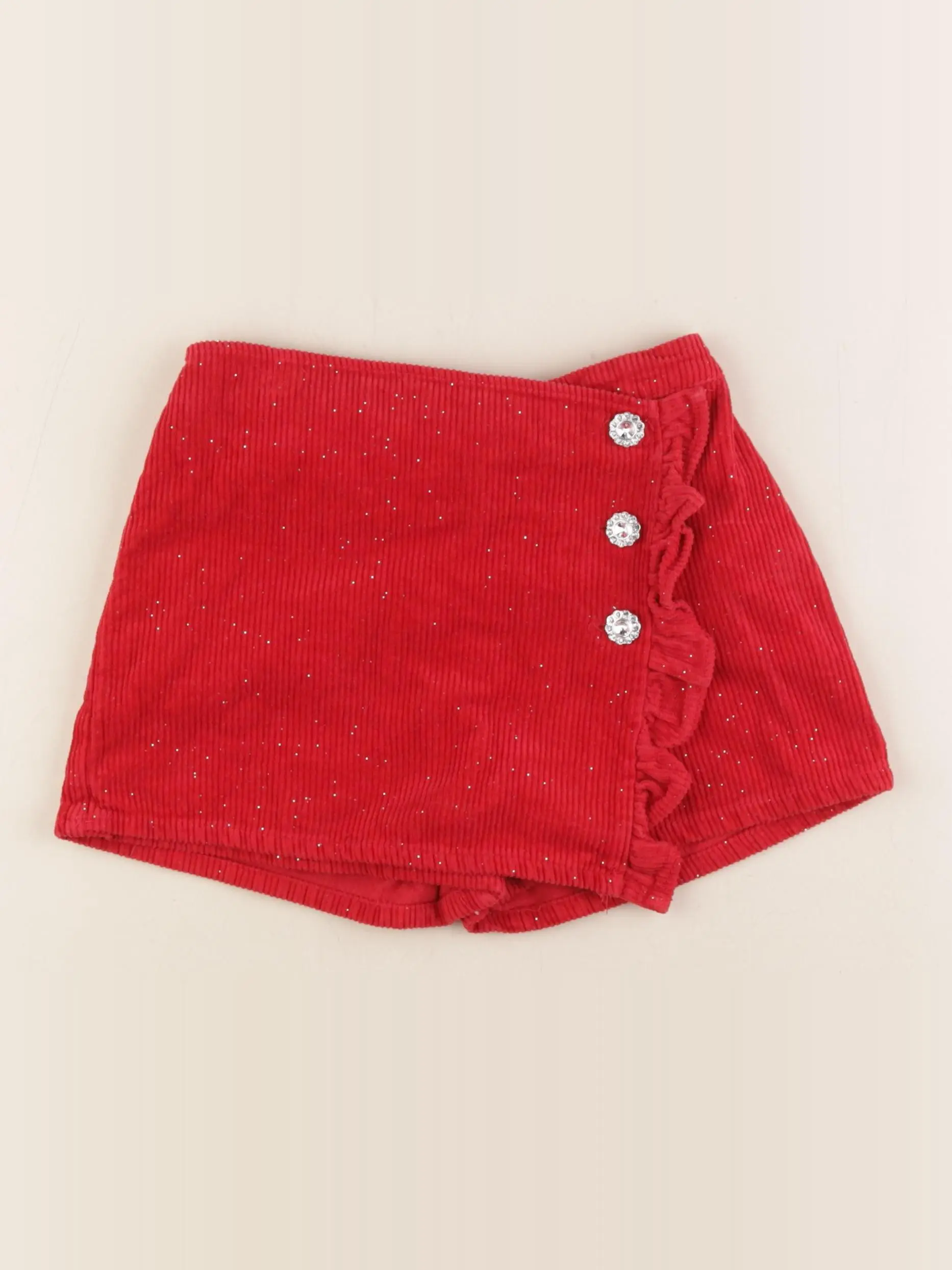 Jupe short rouge, or
