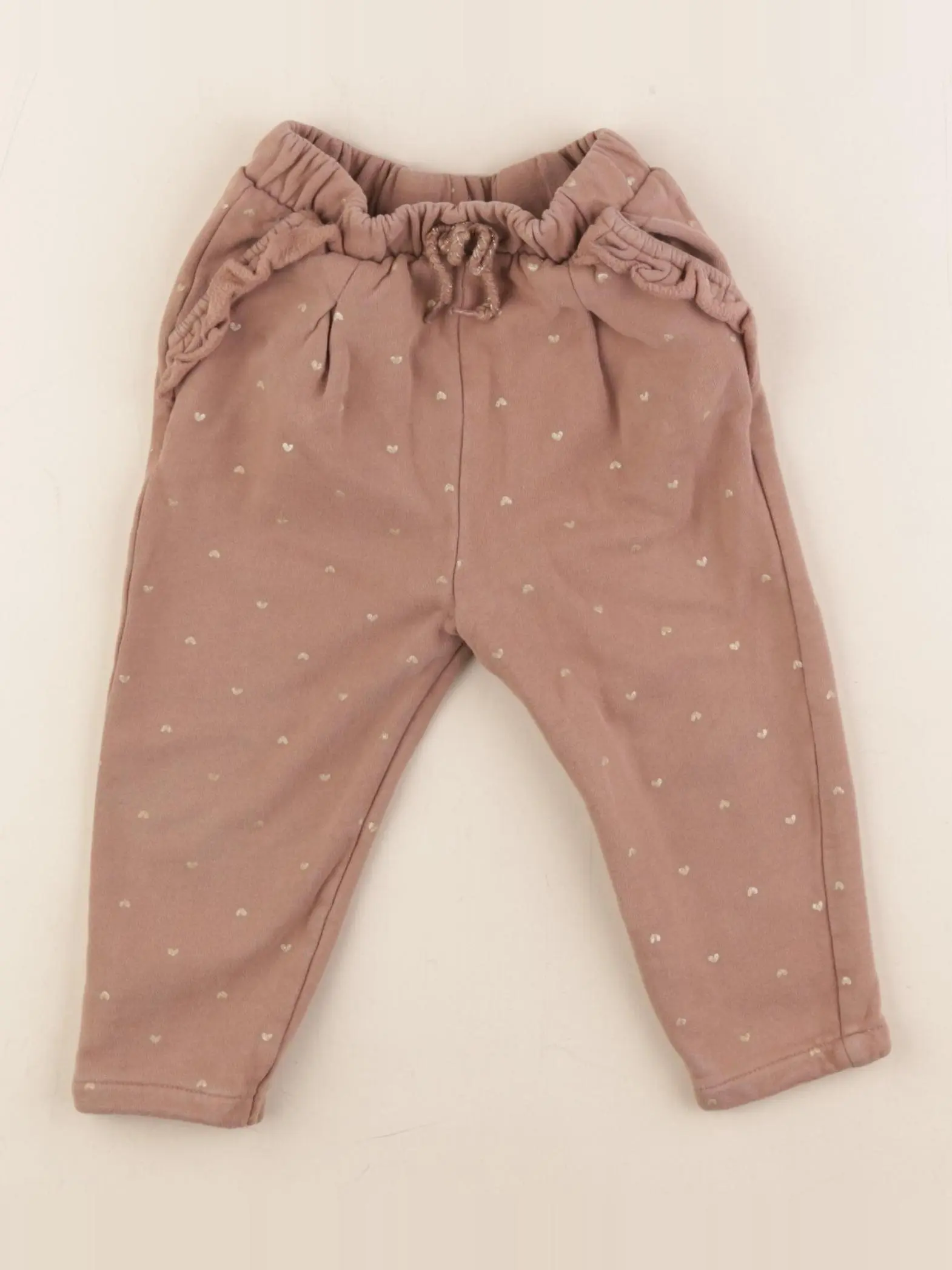 Pantalon marron, or