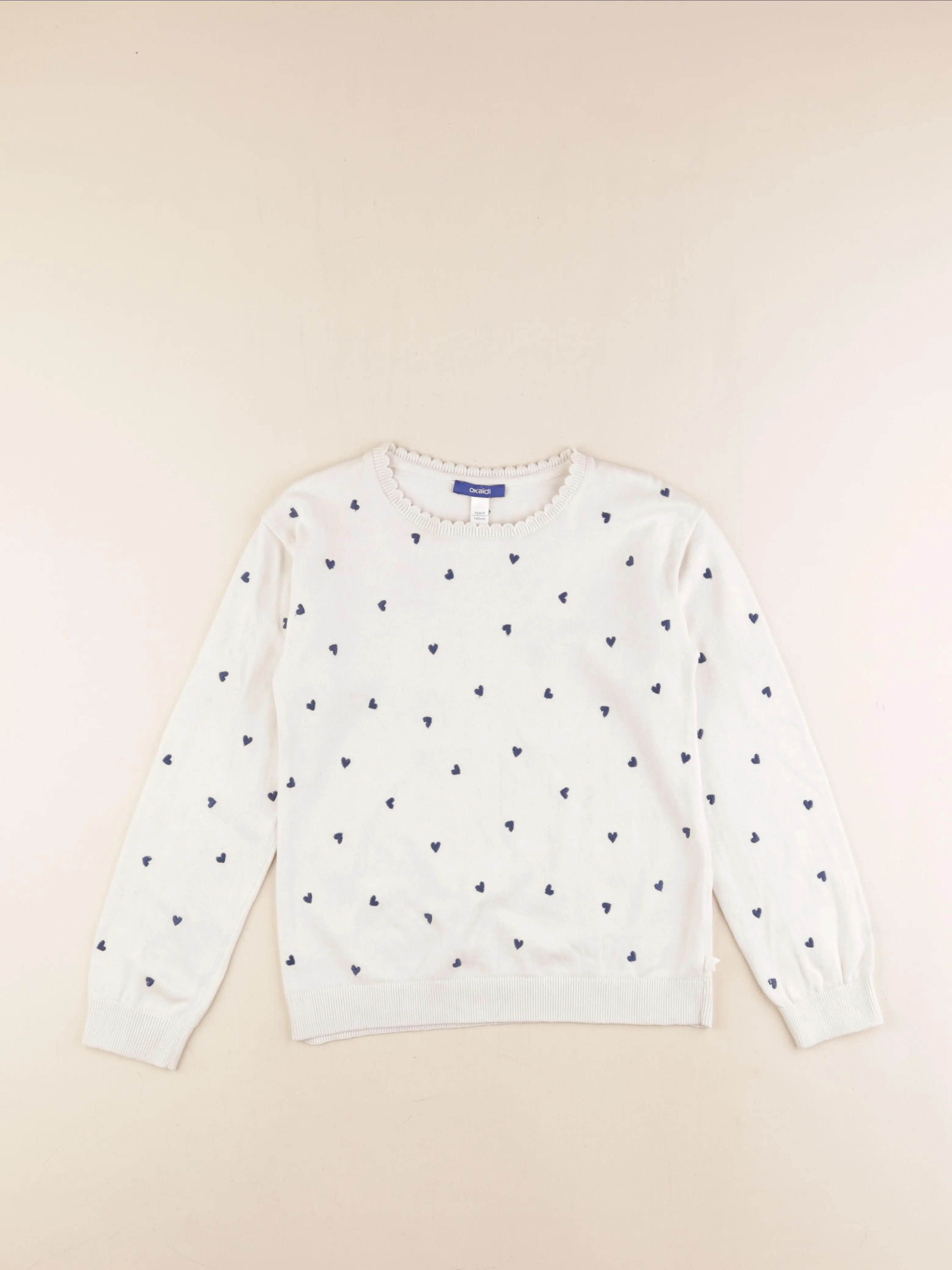 Pull beige, bleu
